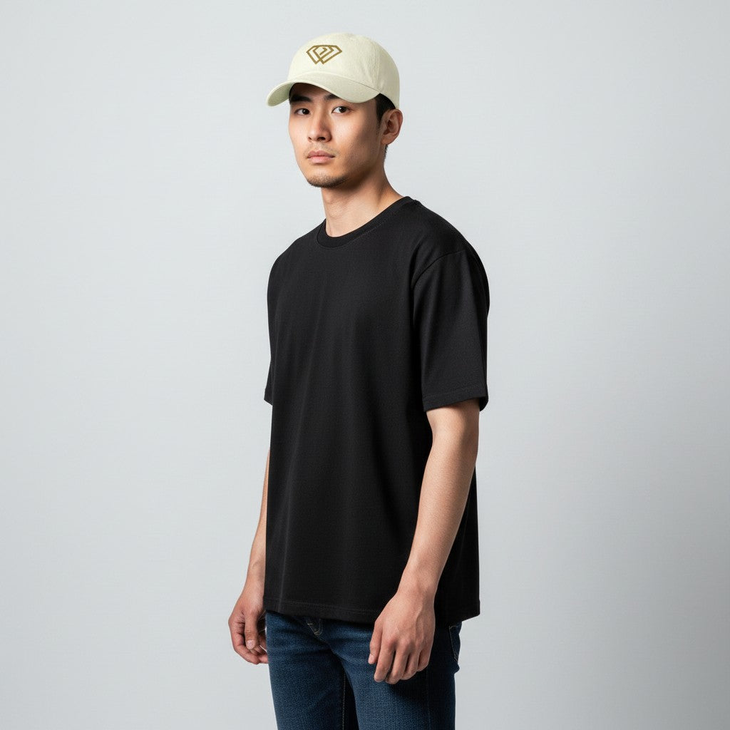 Hustler Design cream 100% chino cotton dad cap with gold diamond logo. Low profile, 6-panel, metal buckle.