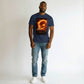 Dunkelblaues Baumwoll-T-Shirt von Hustler Design mit einem dramatischen Weltraum-Design, das eine Sonneneruption und ein Raumschiff zeigt.