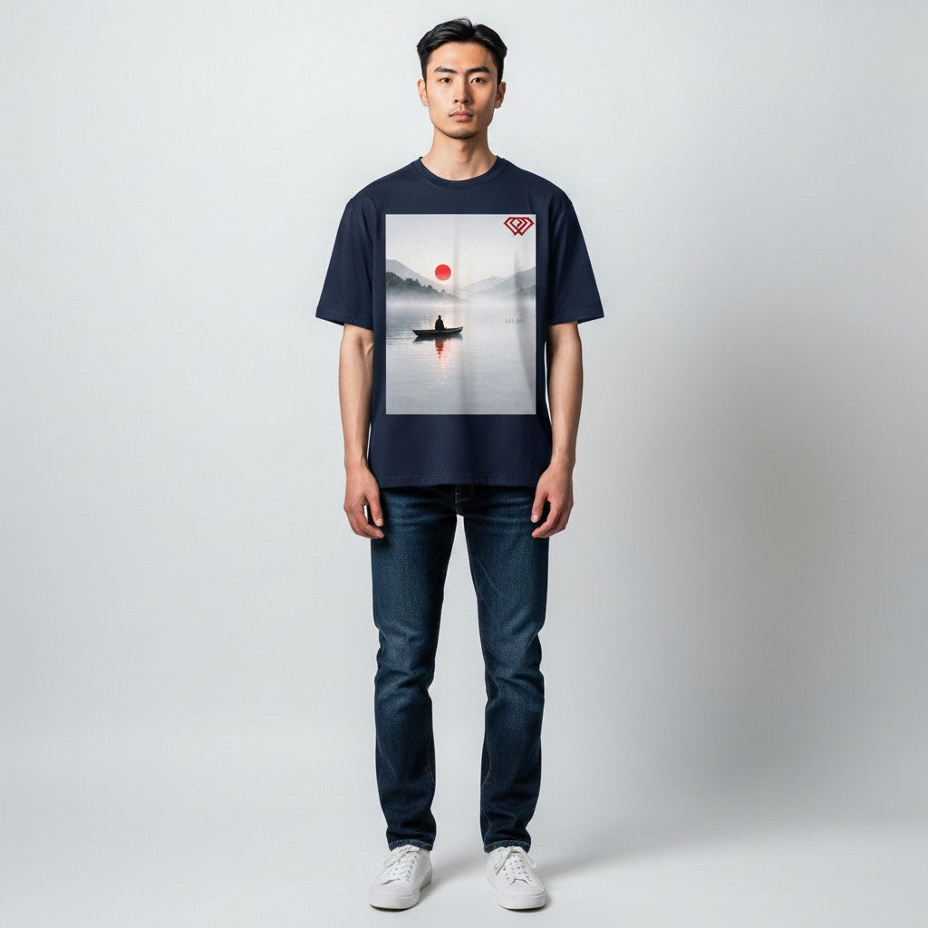 Hustler Design navy blue unisex t-shirt with a serene graphic of a person in a boat on a misty lake at sunrise, with the text "Let go."