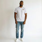 Hustler Design white polyester t-shirt with gold diamond logo and black trim, suitable for sports.