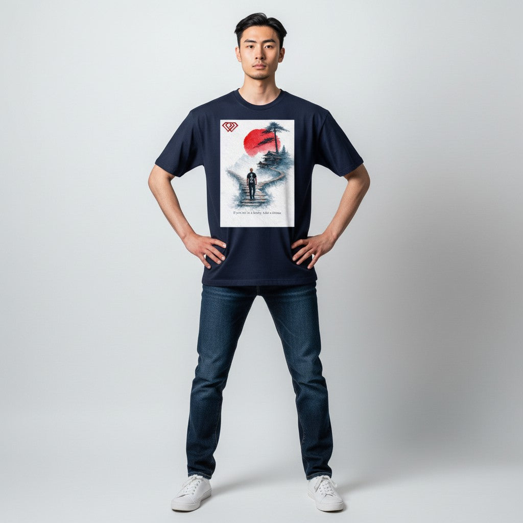 Hustler Design navy blue unisex t-shirt with a minimalist Japanese-inspired graphic featuring a man walking up stone steps towards a traditional building under a red sun.