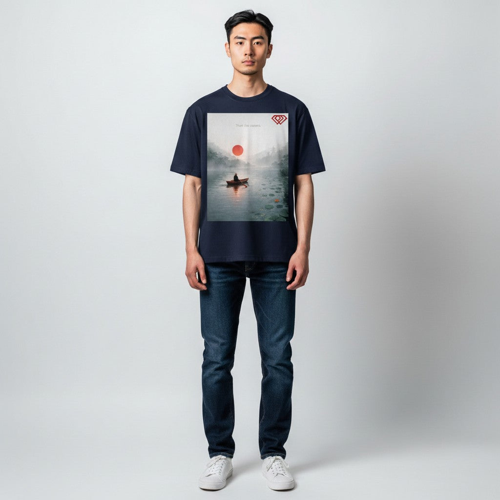 Hustler Design navy blue unisex t-shirt with a serene lake scene graphic, featuring a person in a boat under a red sun.