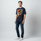 Hustler Design navy blue unisex t-shirt with a minimalist Zen aesthetic graphic of a bonsai tree and a red sun. Text reads "Rooted in being."