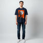 Hustler Design navy blue unisex t-shirt with a graphic print of a person meditating under a tree with a large moon and orange sky.